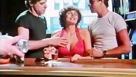 Desiree Cousteau, Rod Pierce, Ron Hudd in xxx classic porn threesome fucking in a cafe