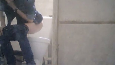 Skinny white girl with tiny booty pissing in the restroom