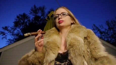 A Bitch In A Fur Coat Is Smoking A Cigar