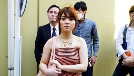 An awesome Asian redhead Mari Motoyama is stroking a dick